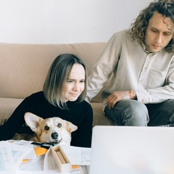 two women looking at computer at home