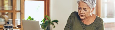 concerned woman working at computer